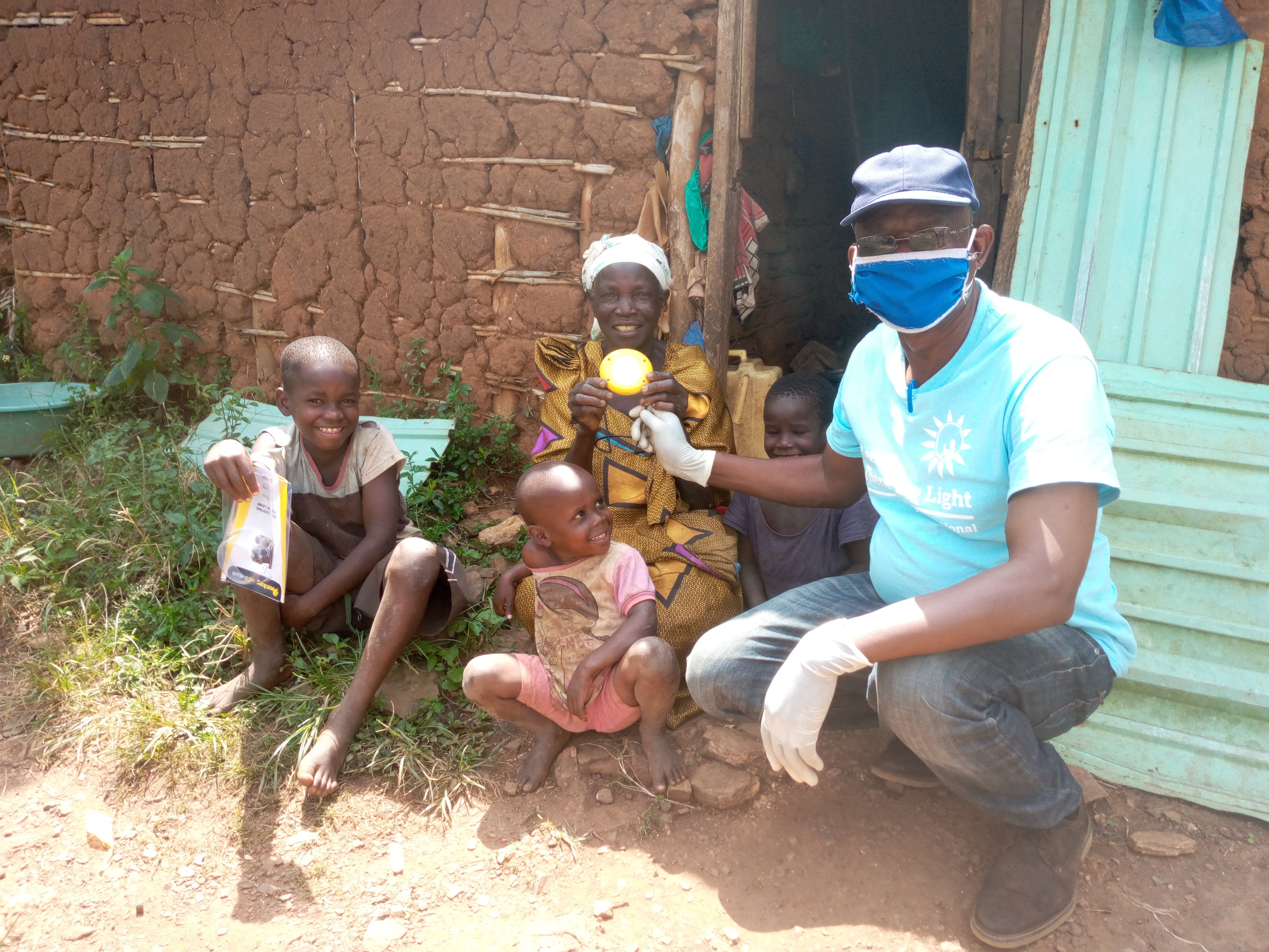 CESA-Uganda gives out solar lights to help families in lockdown.
